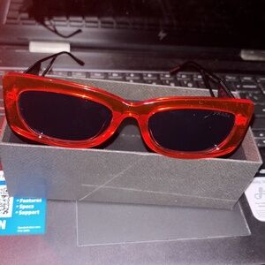 Red Prada sunglasses with serial number